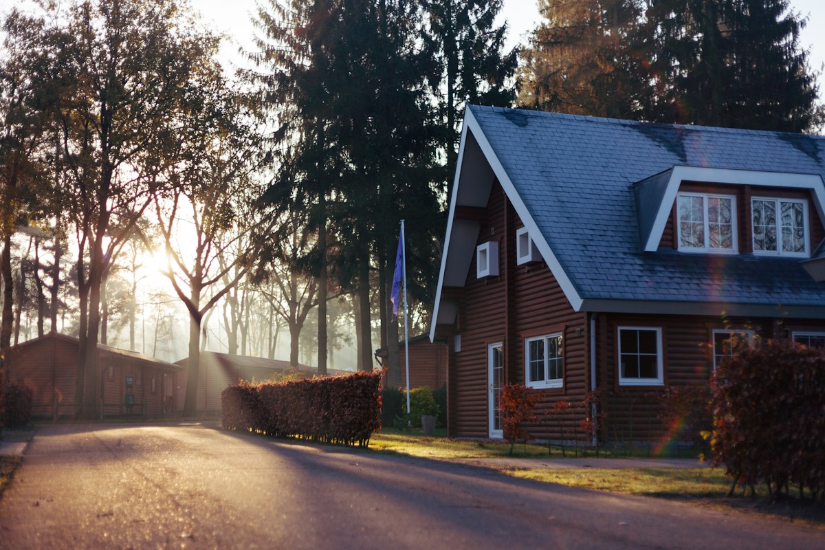 Brick home on a quiet tree-lined street