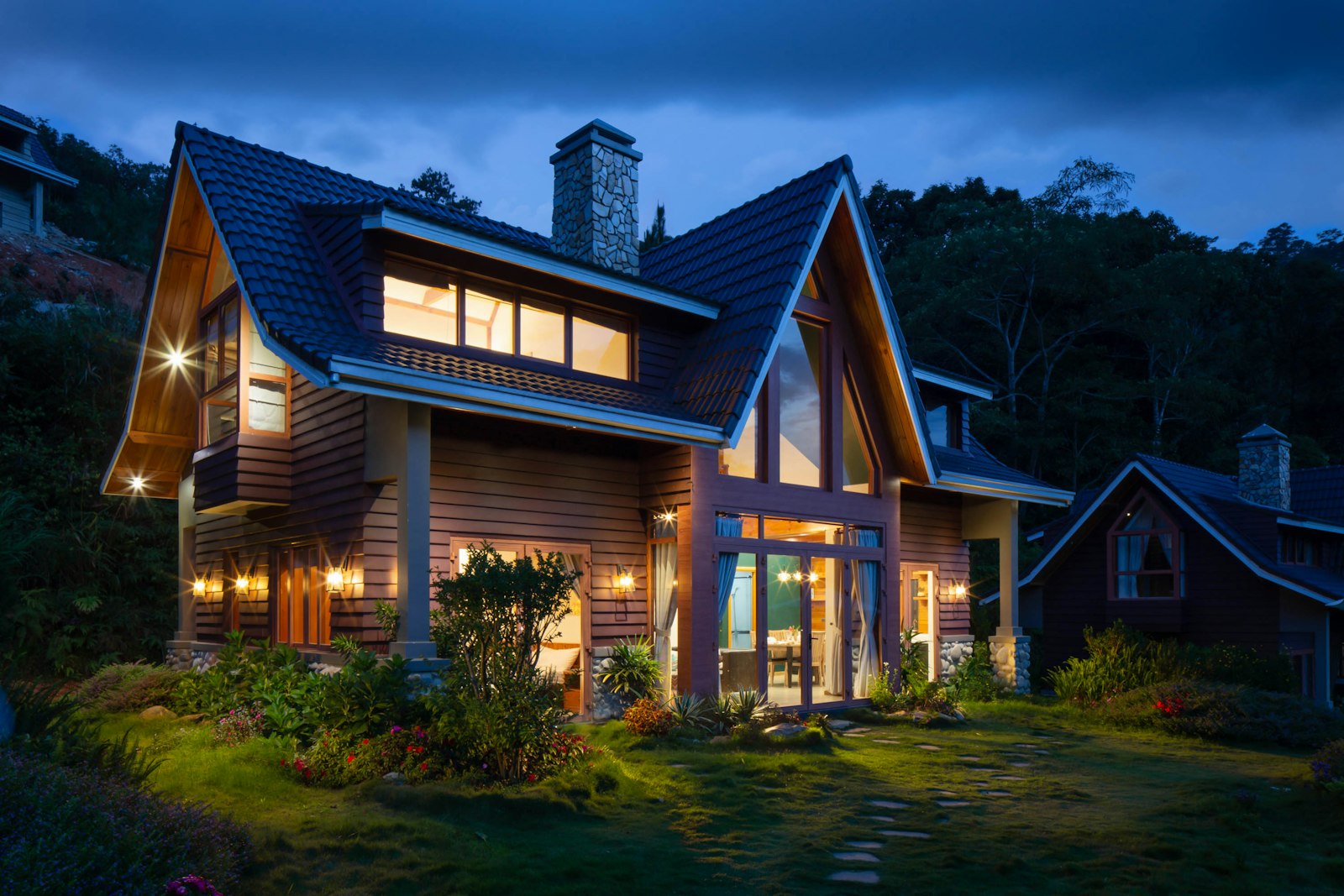Timber home glowing at dusk